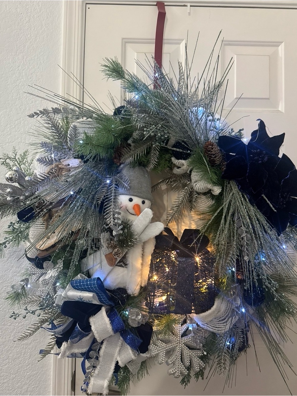Holiday Snowman Pine Wreath with Blue Accents, Fairy lights and Lighted Gift - Picture 3 of 5